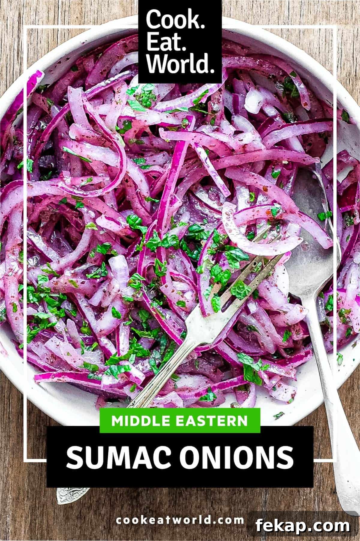 Sumac Onions | cookeatworld.com A small bowl of Sumac Onions with a small serving fork and spoon