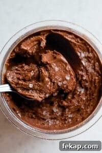 Ninja Creami Salted Chocolate Protein Ice Cream Recipe 7 Close up view of ninja creami protein ice cream with coarse sea salt.