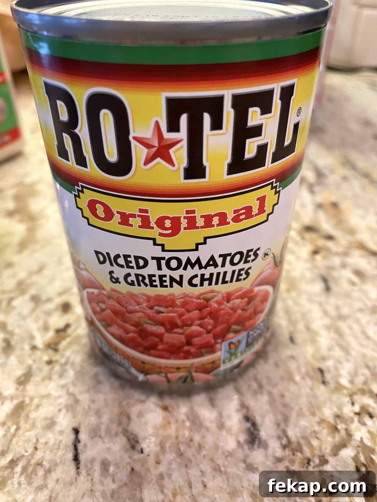 Restaurant-Style Mexican Fried Rice Recipe 5 One can of original Rotel on a kitchen counter.