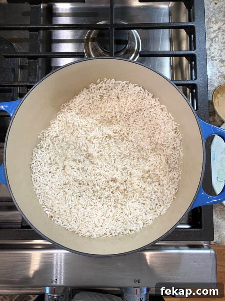 Restaurant-Style Mexican Fried Rice Recipe 10 A pot of white rice.