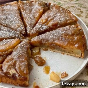 pear upside down cake on a plate.