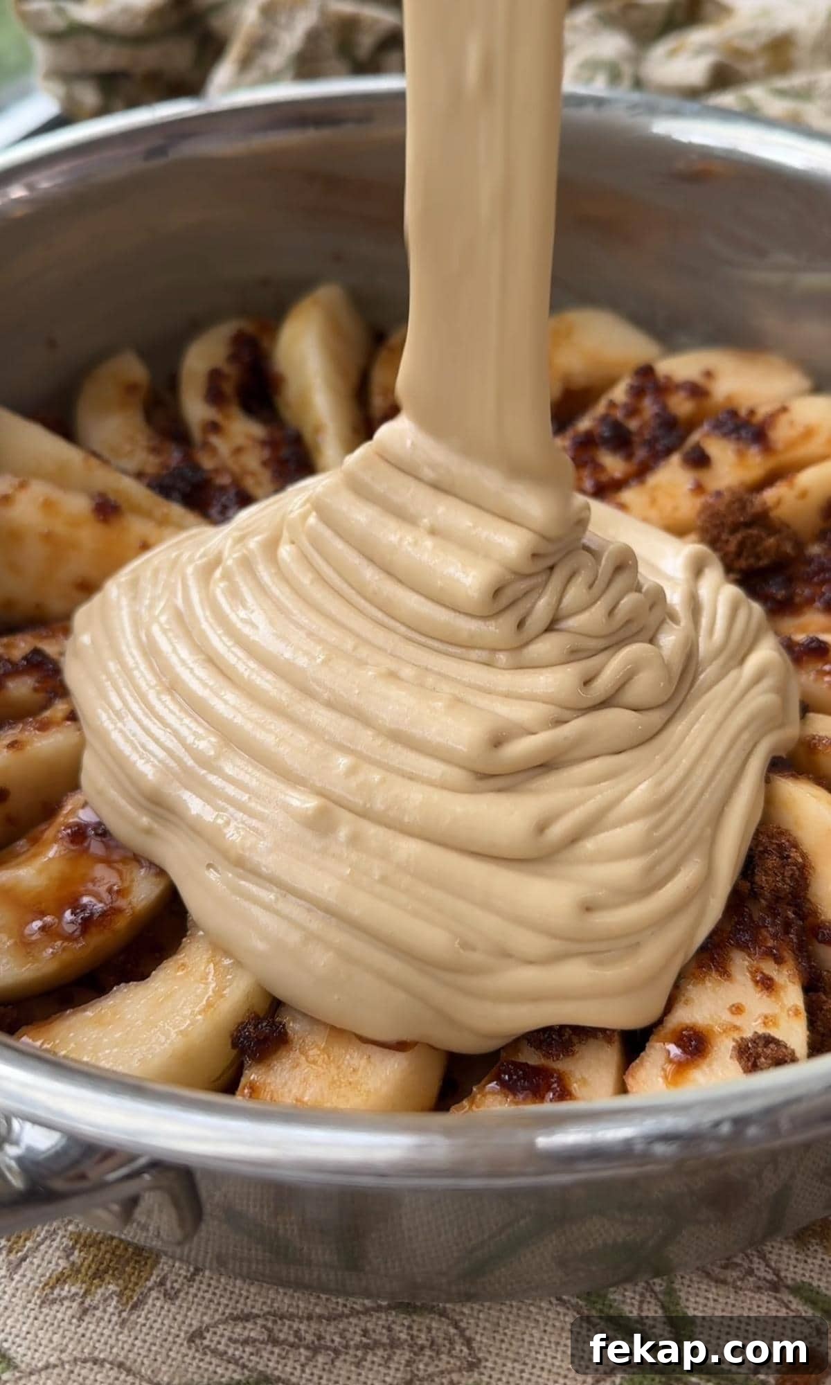 Pear Upside-Down Cake with Warm Fudge Sauce 8 pouring cake batter on the pears.