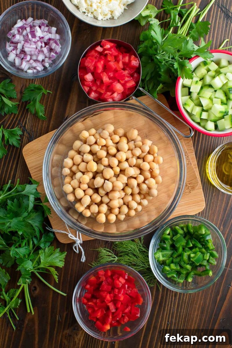 Mediterranean Chickpea and Feta Salad with Lemon Vinaigrette 4 Chickpea Chopped Salad Ingredients in Bowls