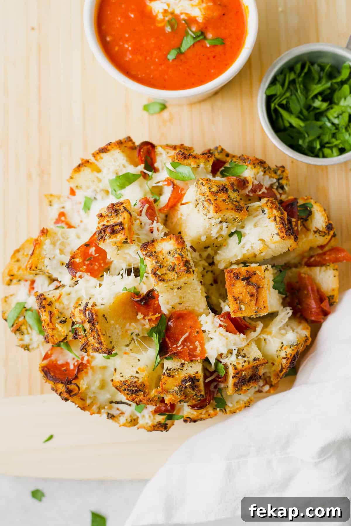 pizza stuffed pull apart bread on cutting board
