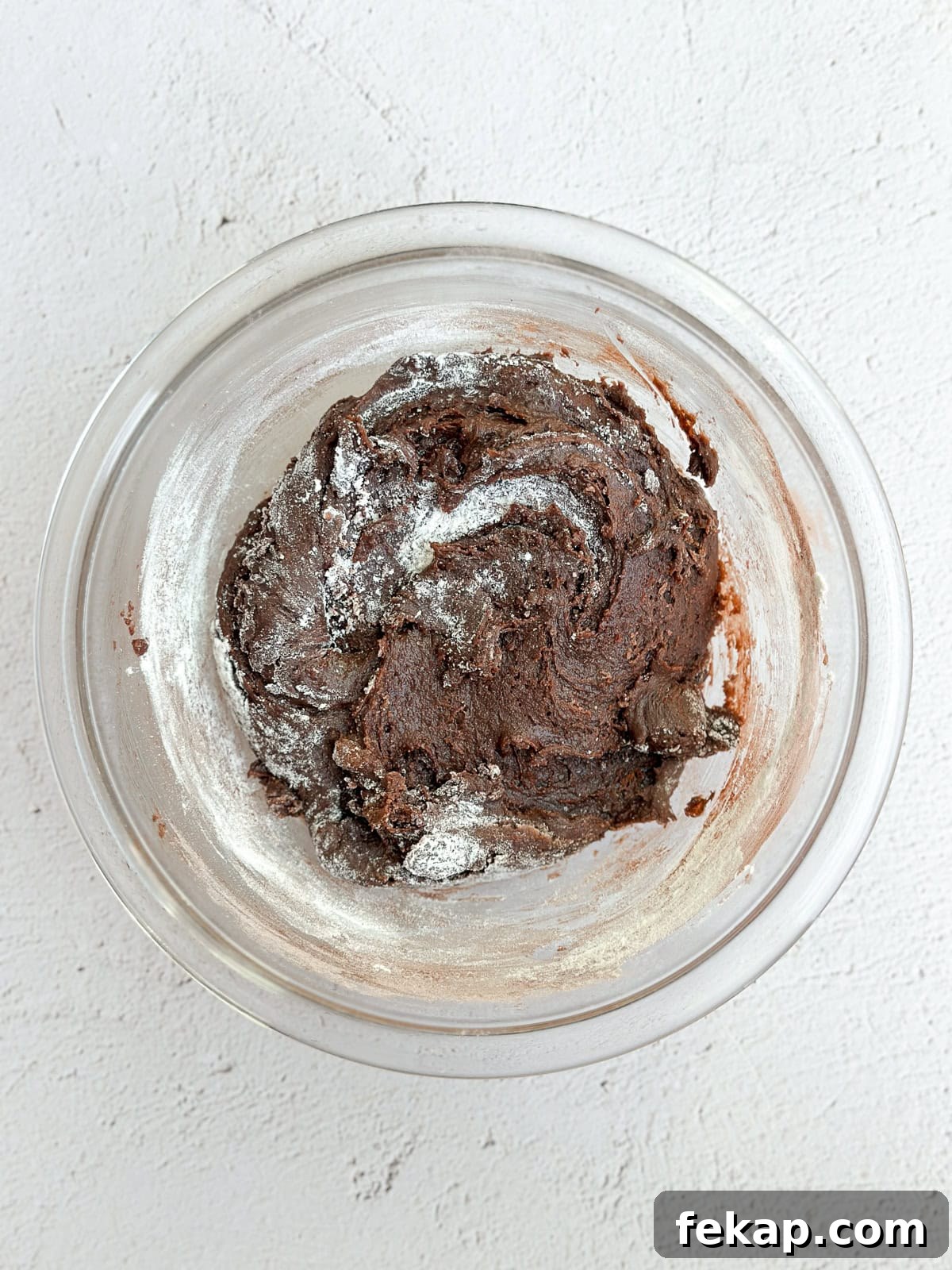 Fudgy Double Chocolate Cookie Bars Recipe 6 adding in the dry ingredients.