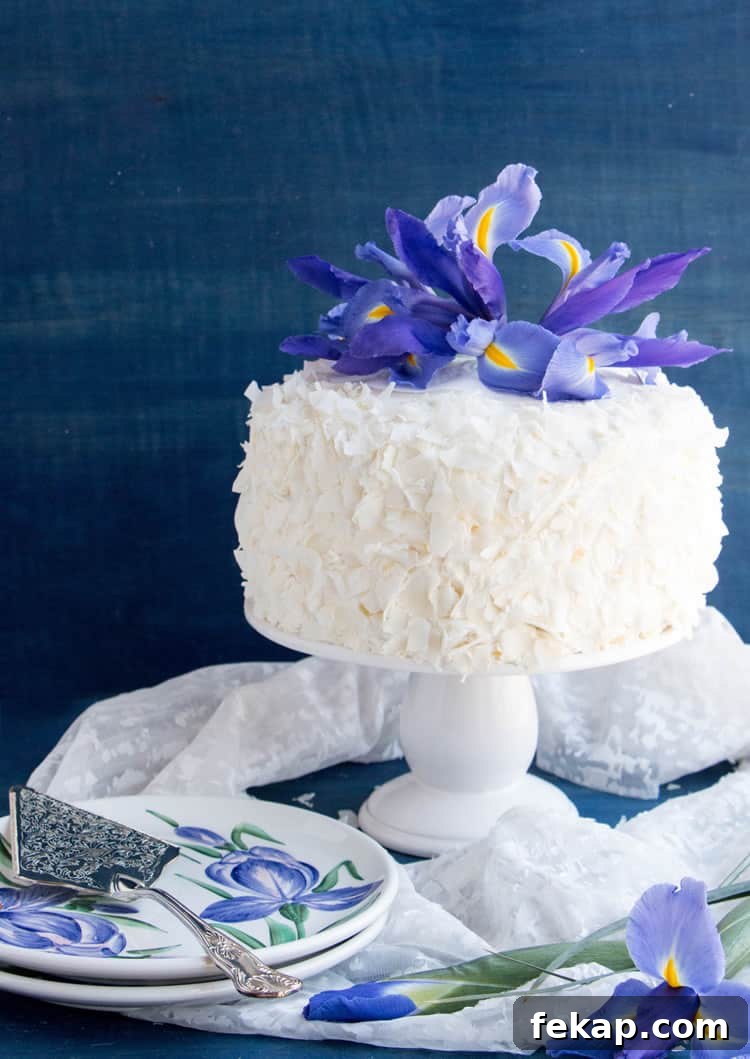Silky Mandarin Orange and Pineapple Cream Cake Recipe 2 Mandarin Orange Pineapple Cream Cake. Layers of mandarin orange cake, filled with pineapple coconut pastry cream and covered in pineapple whipped cream and coconut chips. Perfect for Easter or Spring gatherings.