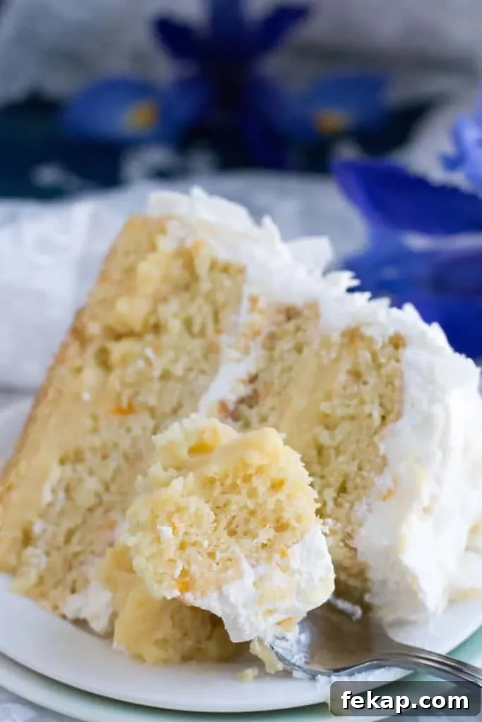 Silky Mandarin Orange and Pineapple Cream Cake Recipe 7 Mandarin Orange Pineapple Cream Cake. Layers of mandarin orange cake, filled with pineapple coconut pastry cream and covered in pineapple whipped cream and coconut chips. Perfect for Easter or Spring gatherings.