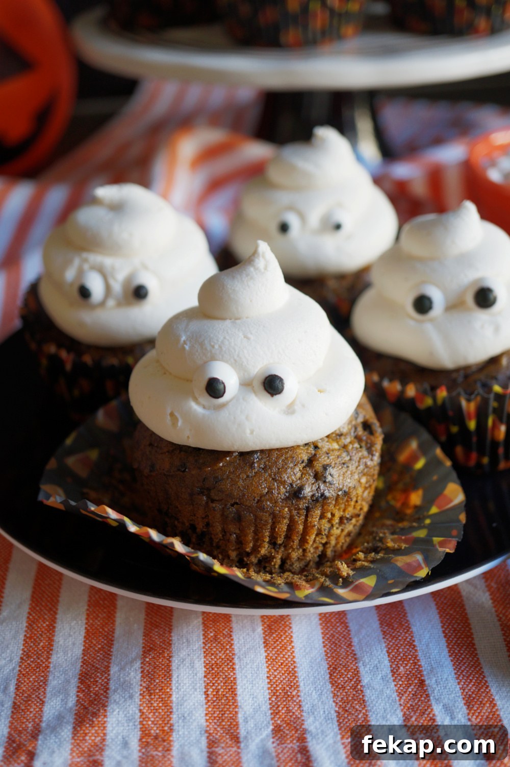 Vegan Oreo Pumpkin Cupcakes with Creamy Frosting 6 oreo pumpkin cupcake with wrapper off