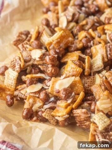 Chocolate Chex mix on parchment paper.