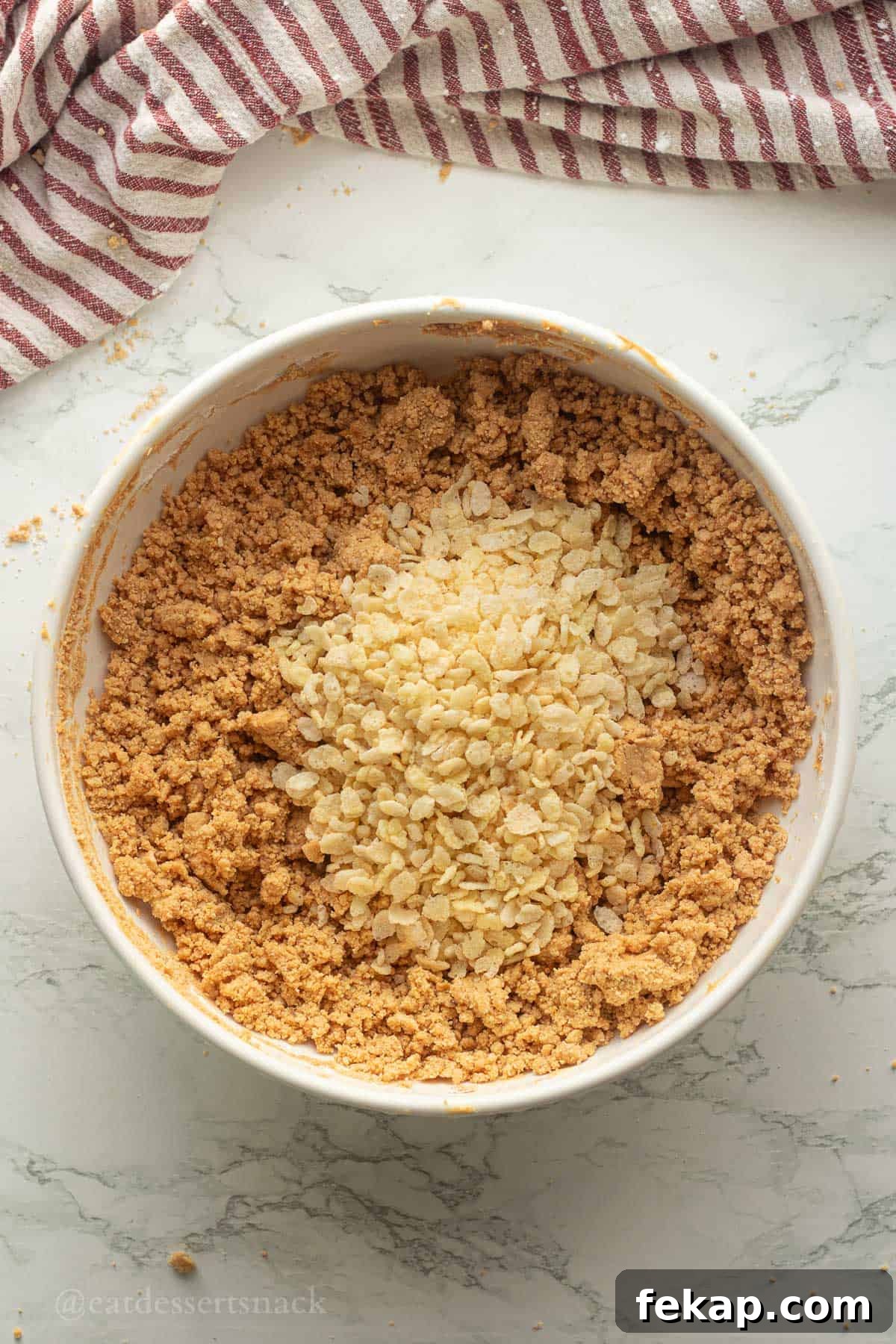 Rice crispies in peanut butter mixture.