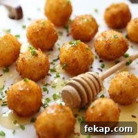 Crispy goat cheese poppers with honey