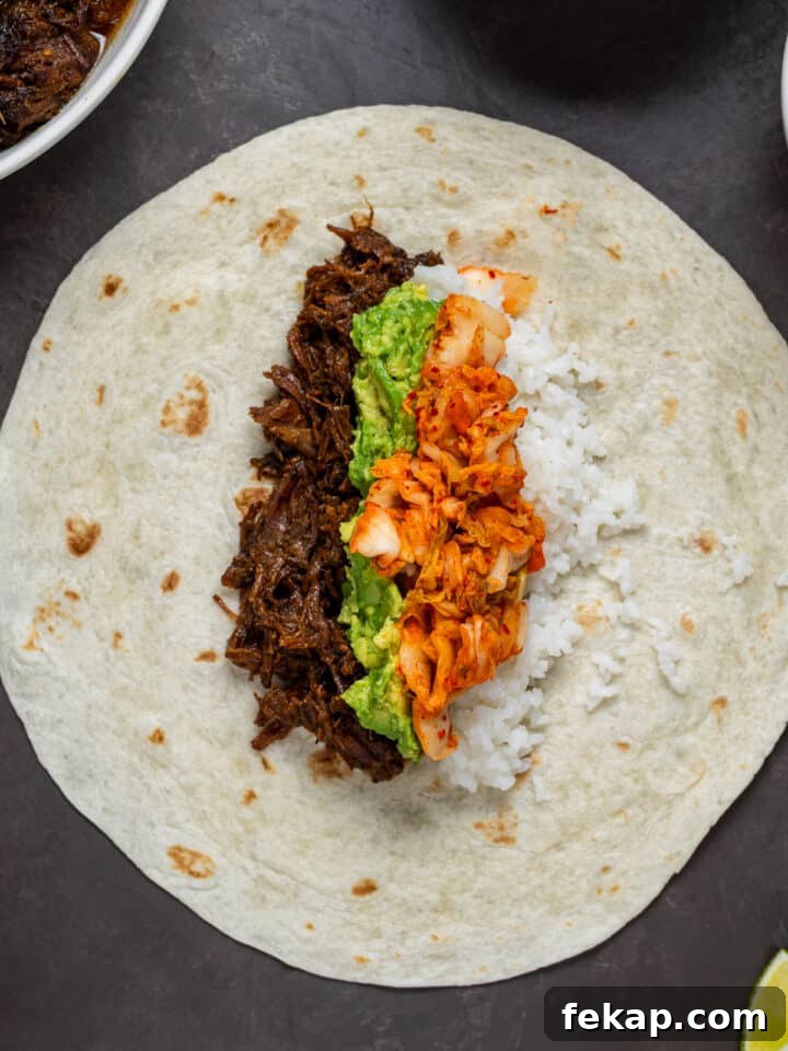 Korean BBQ Shredded Beef Burritos Recipe 7 avocado and kimchi added to burrito