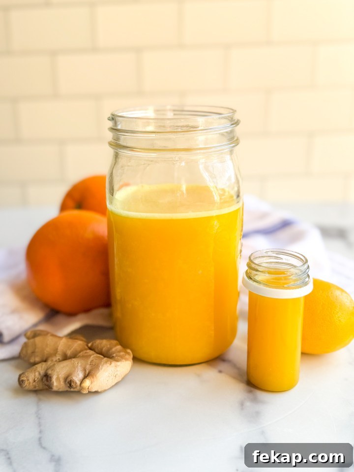 DIY Ginger Immunity Shots for Cold and Flu Defense 2 Glasses of homemade ginger immunity shots