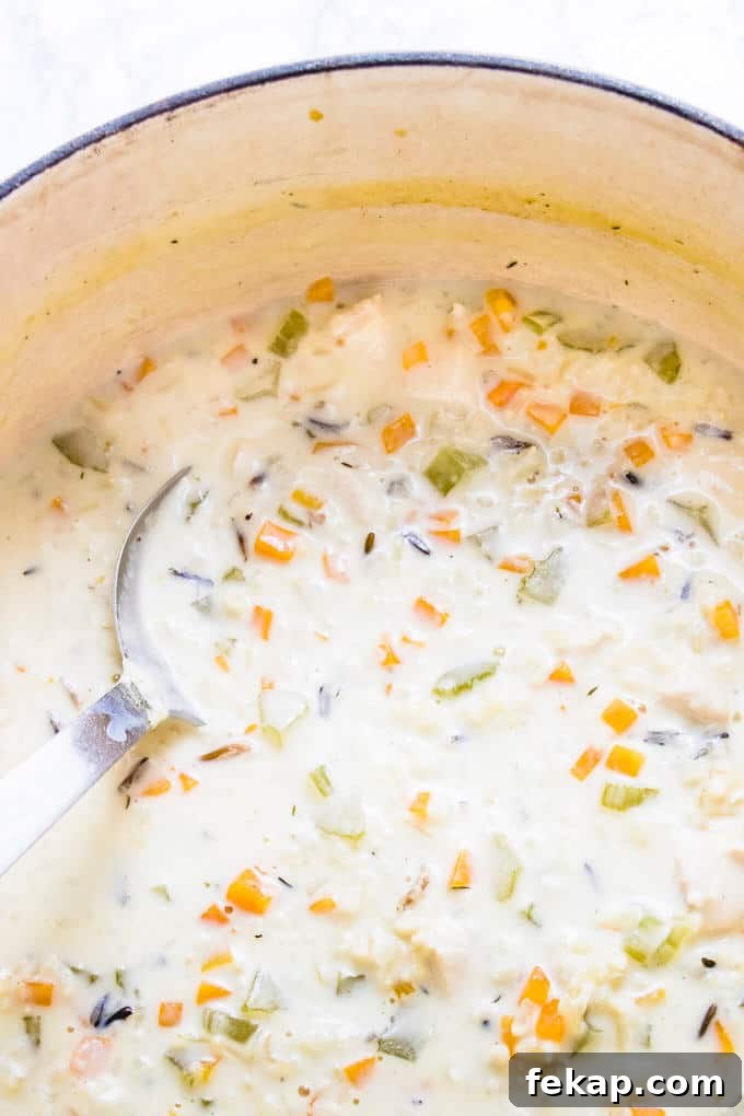 There's no better way to keep the fall wind at bay than to sit down and cozy up with this nourishing and hearty lightened up creamy chicken rice soup. There's no better way to keep the fall wind at bay than to sit down and cozy up with this nourishing and hearty lightened up creamy chicken rice soup.