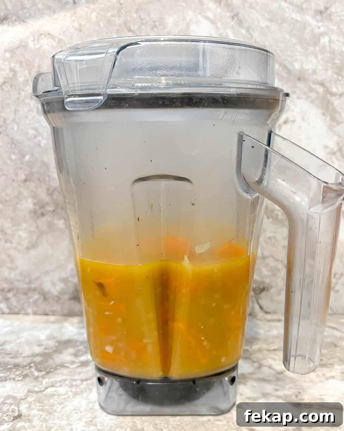 Roasted Pumpkin and Sweet Potato Soup Recipe 6 Pumpkin and sweet potato soup in a blender before blending.