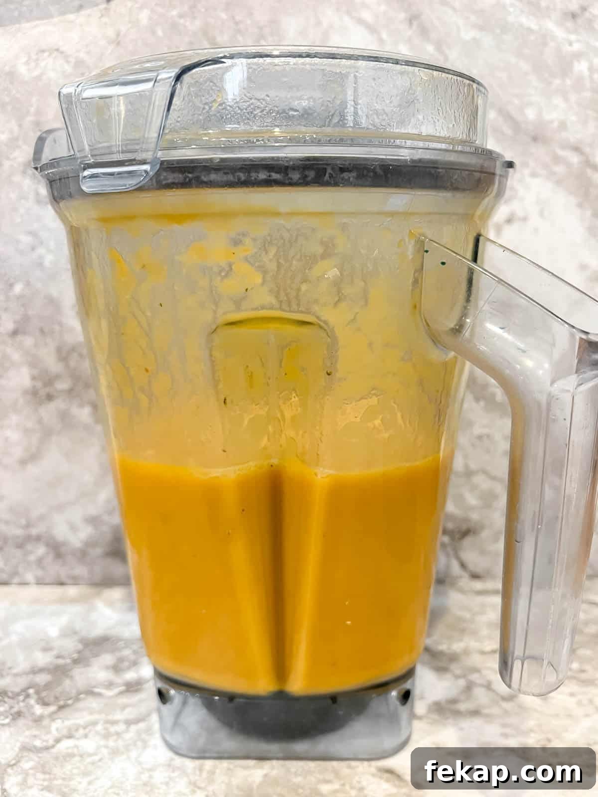 Roasted Pumpkin and Sweet Potato Soup Recipe 7 Pumpkin and sweet potato soup in a blender after blending.