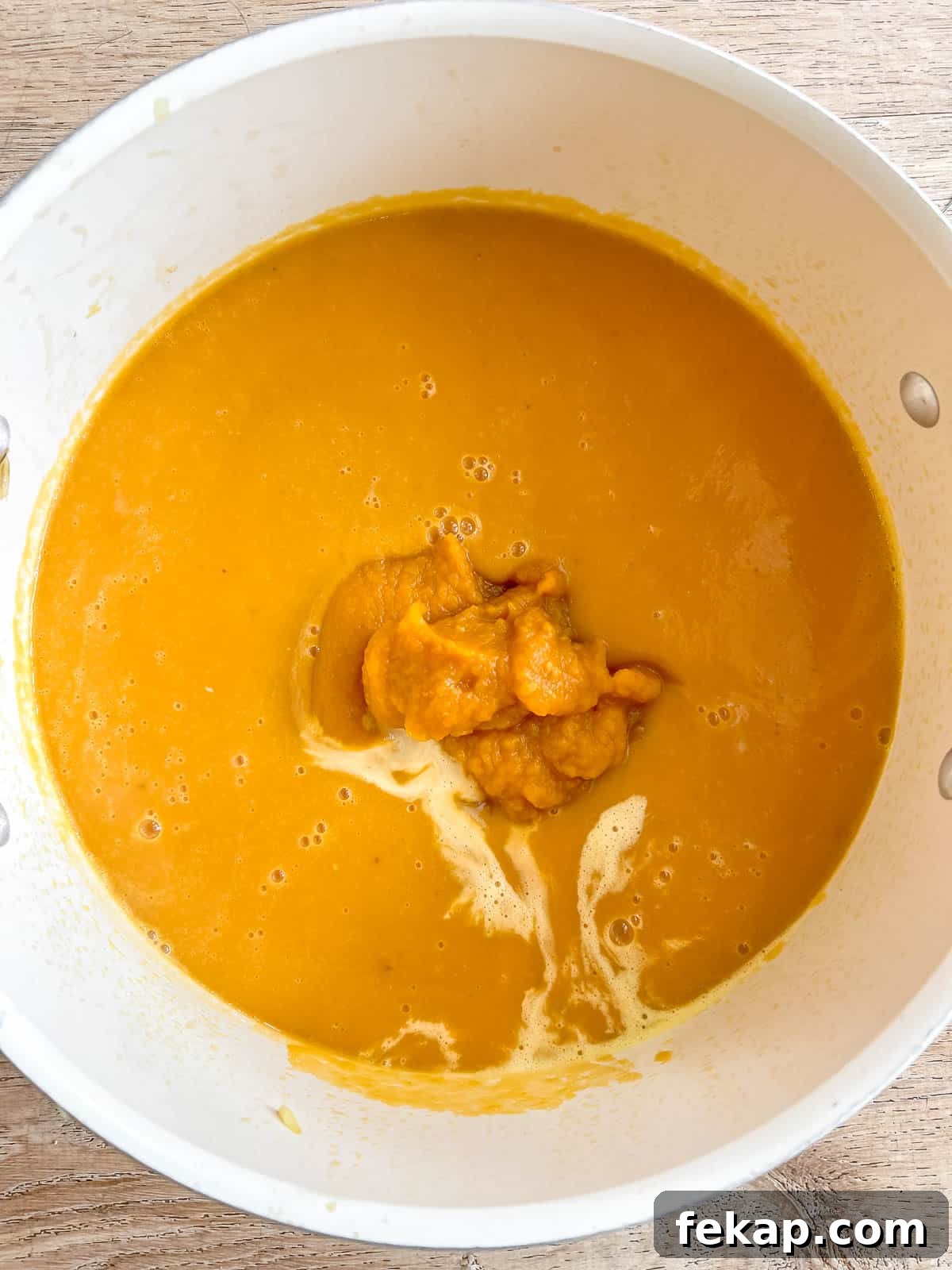 Roasted Pumpkin and Sweet Potato Soup Recipe 8 Pumpkin puree and cream added to soup.