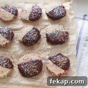Funfetti Shortbread Cookies Dipped in Dark Chocolate 2 Dark Chocolate Dipped Funfetti Shortbread Cookies from thelittlekitchen.net