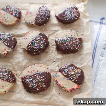Funfetti Shortbread Cookies Dipped in Dark Chocolate 3 Dark Chocolate Dipped Funfetti Shortbread Cookies from thelittlekitchen.net