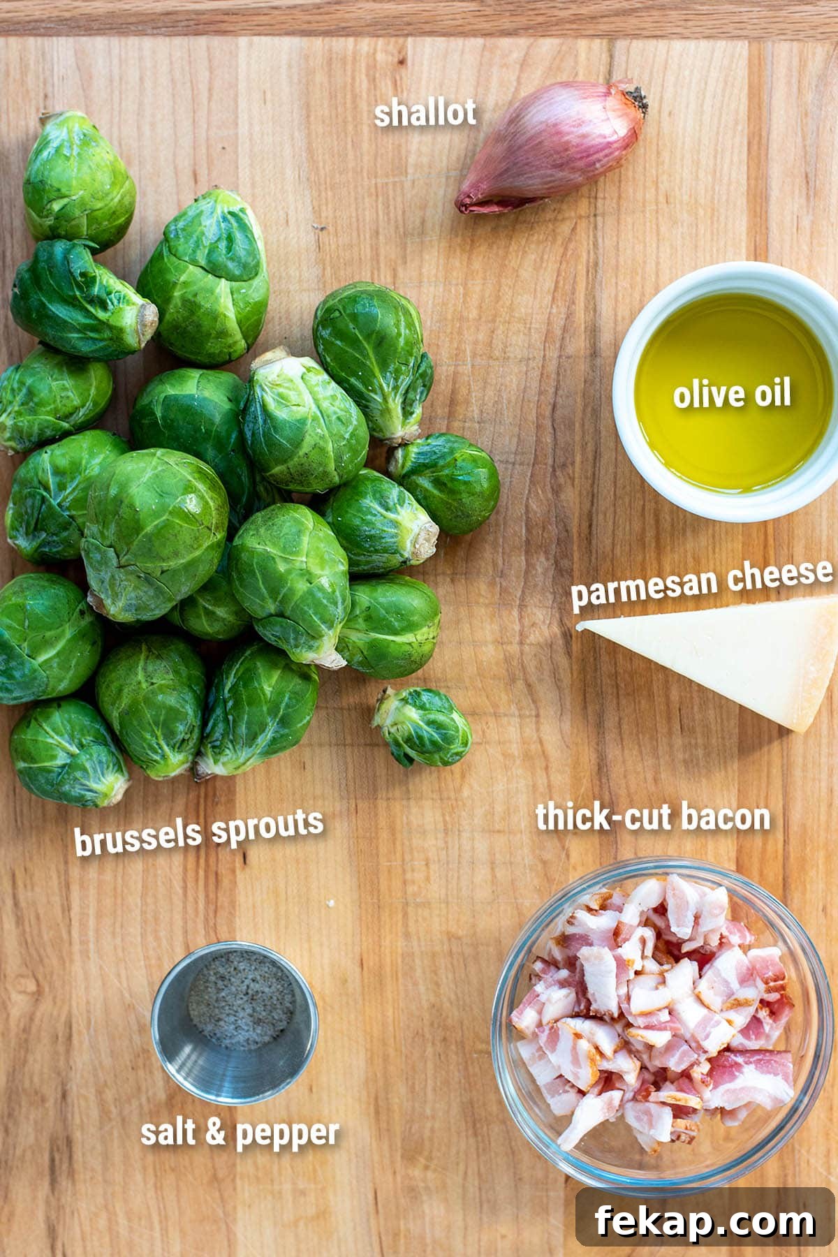 Ingredients to make bacon Brussels sprouts laid out on a cutting board.