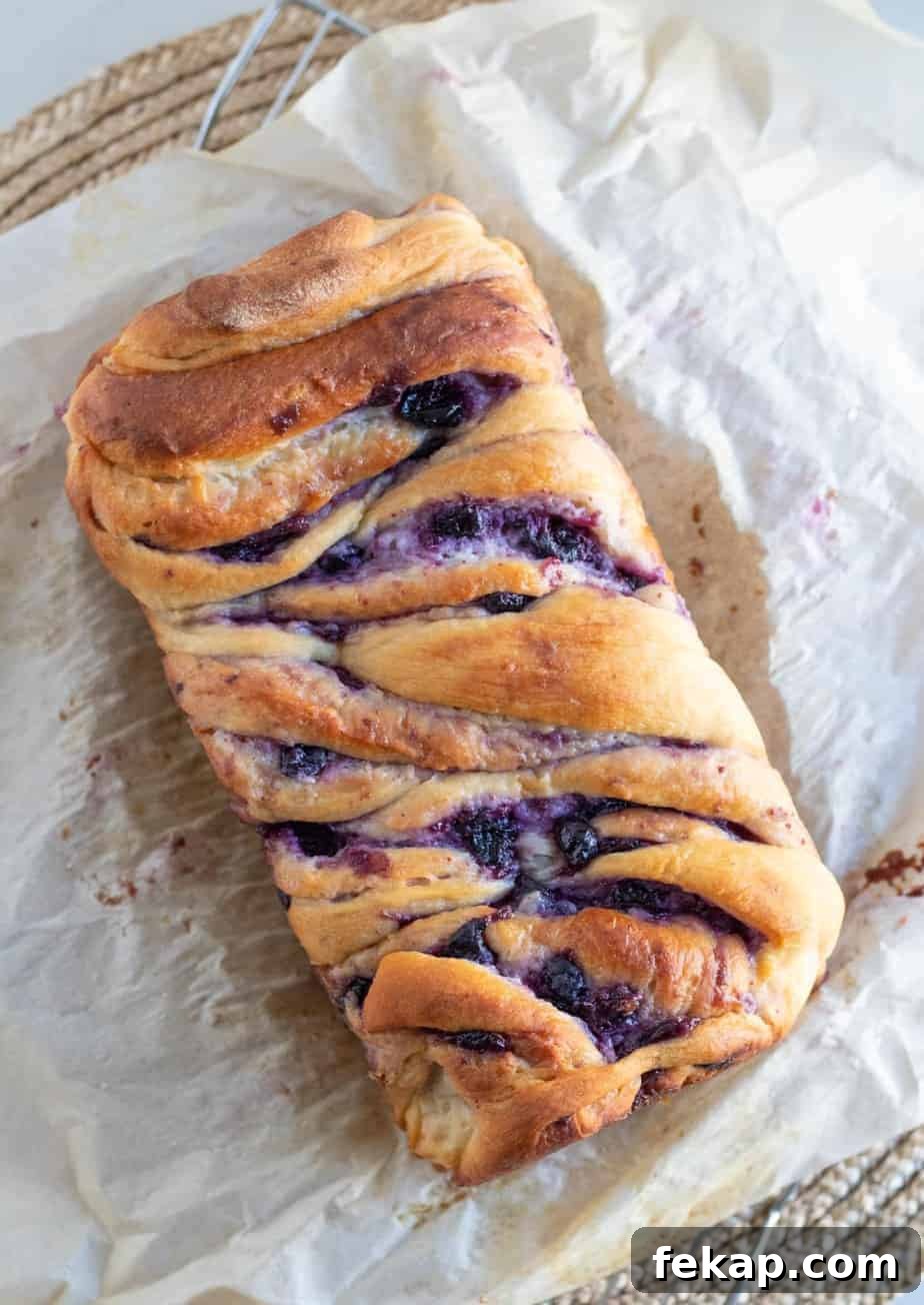 loaf of babka swirled with blueberries