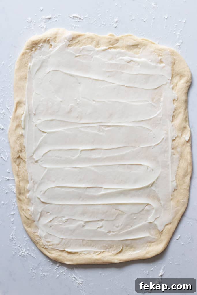 babka dough spread with cream cheese
