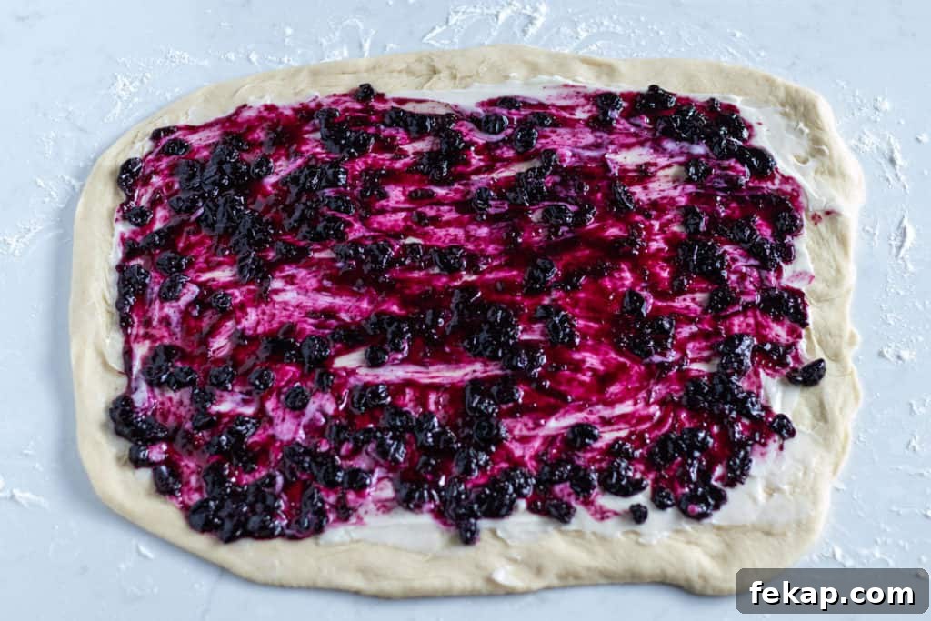 babka dough spread with blueberry preserves