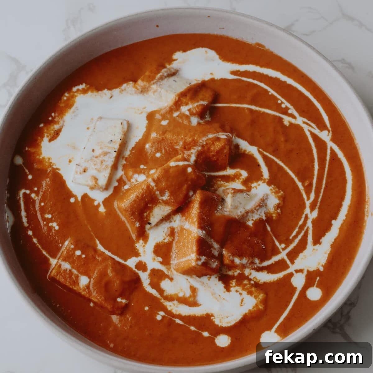 10 Tofu Recipes Meat Eaters Will Actually Love 11 Tofu tikka masala on a plate.