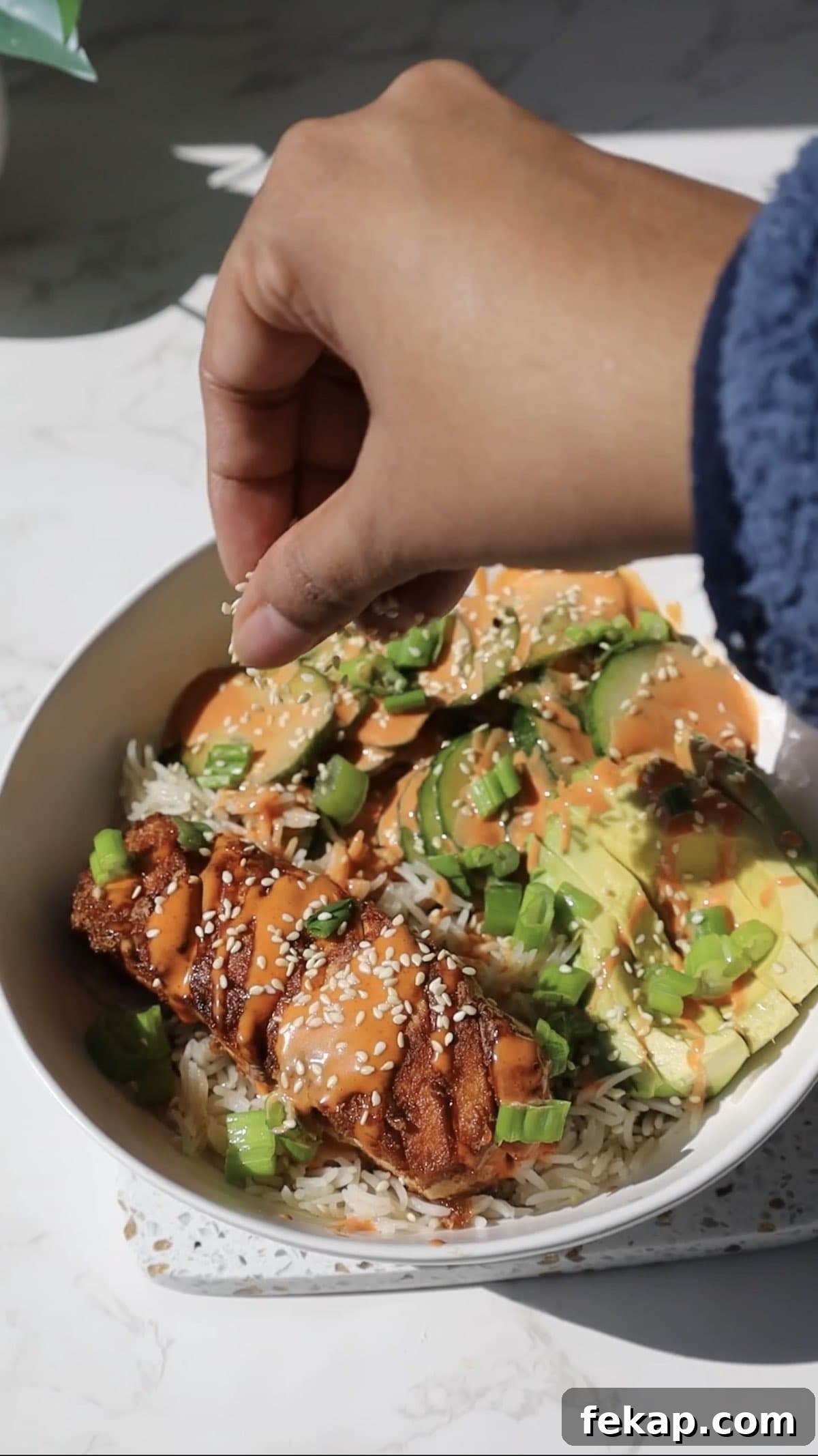 10 Tofu Recipes Meat Eaters Will Actually Love 14 Tofu salmon bowl with avocado and cucumber.