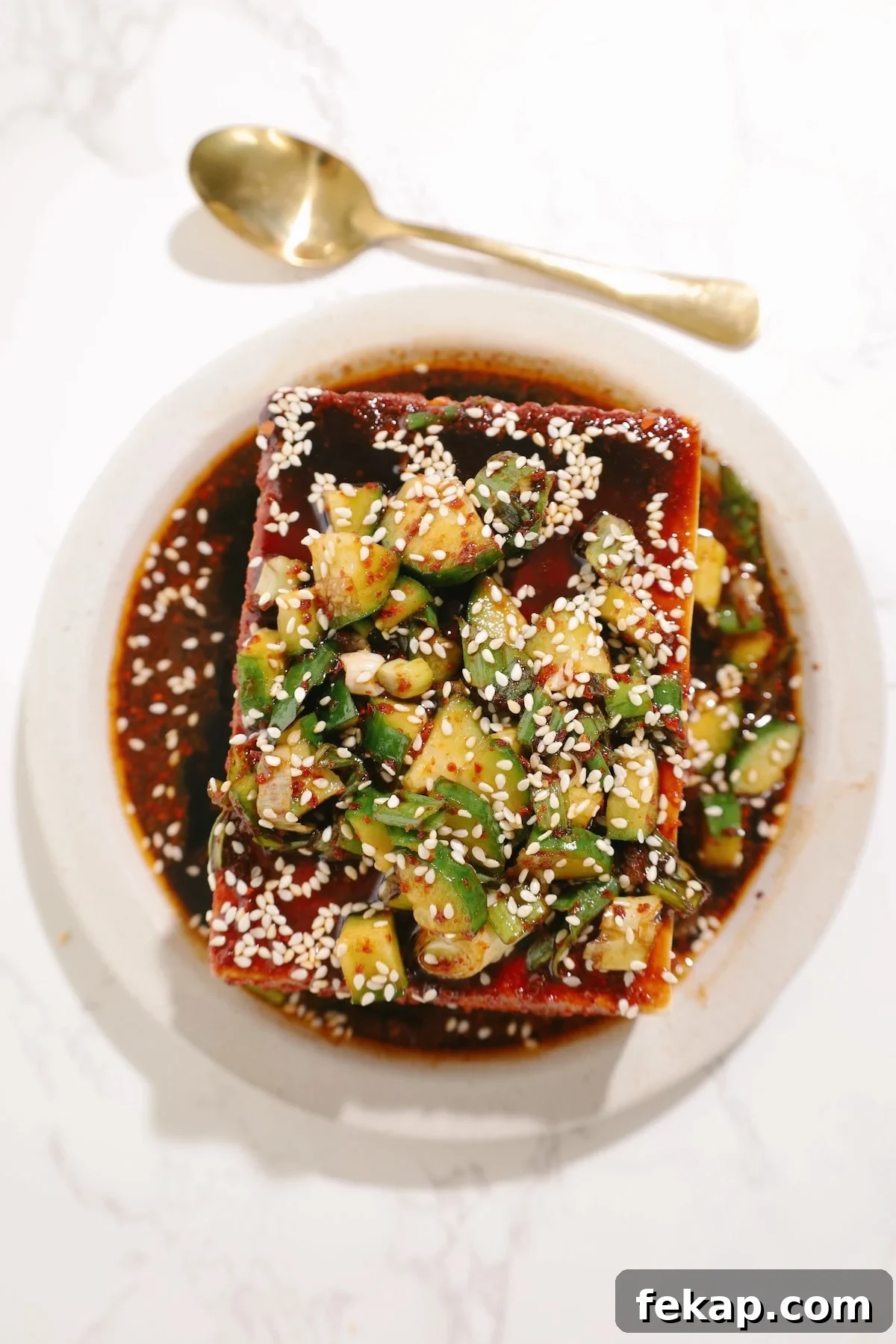 10 Tofu Recipes Meat Eaters Will Actually Love 7 Classic cold silken tofu recipe on a plate.