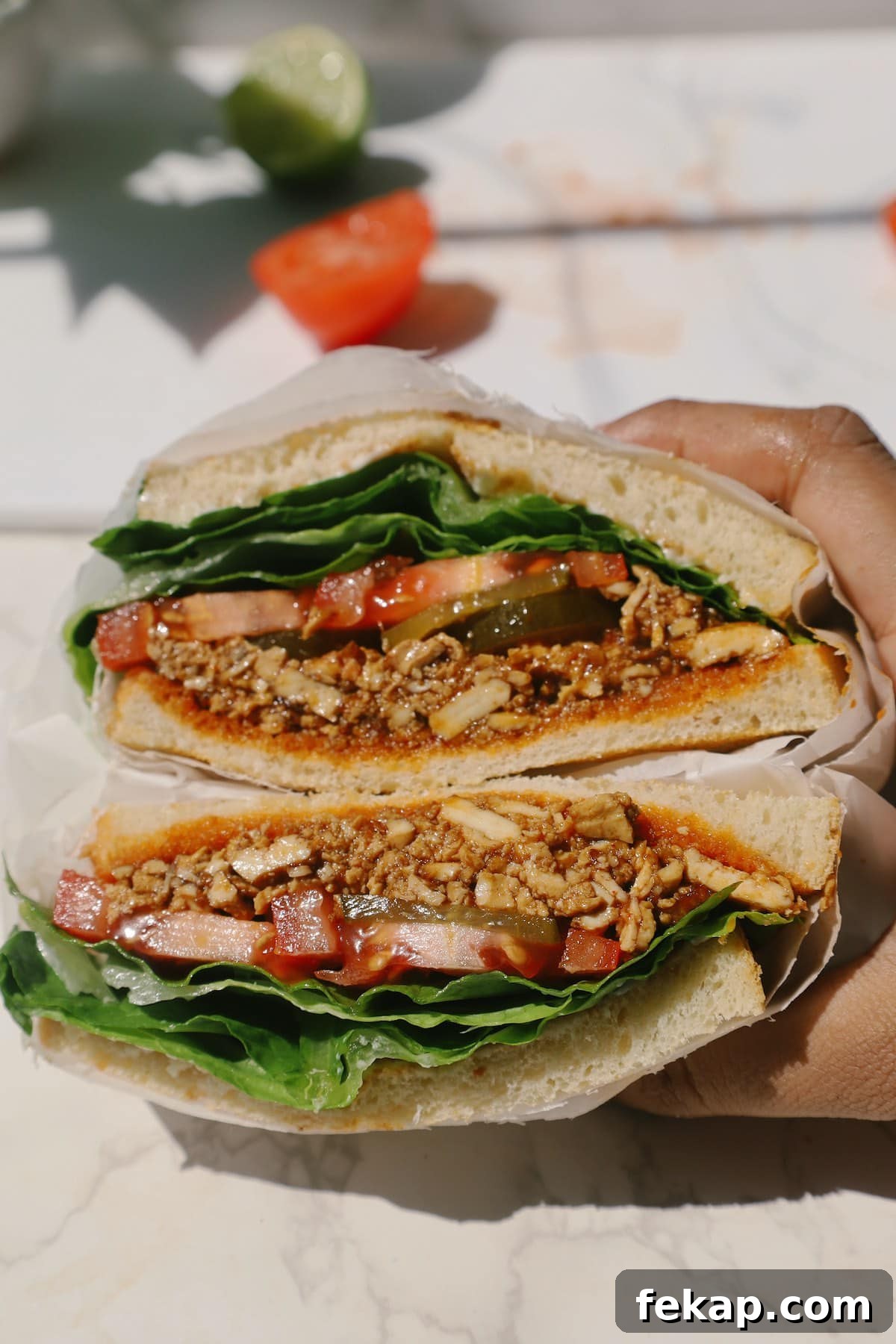 10 Tofu Recipes Meat Eaters Will Actually Love 10 Honey chipotle sandwich with tomatoes and lettuce.