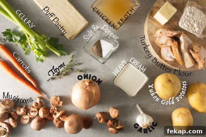Ingredients shot of ninja foodi turkey pot pie: celery, carrots, mushrooms, onion, thyme, puff pastry, chicken broth, salt, pepper, heavy cream, garlic, yukon gold potatoes, turkey, butter, flour