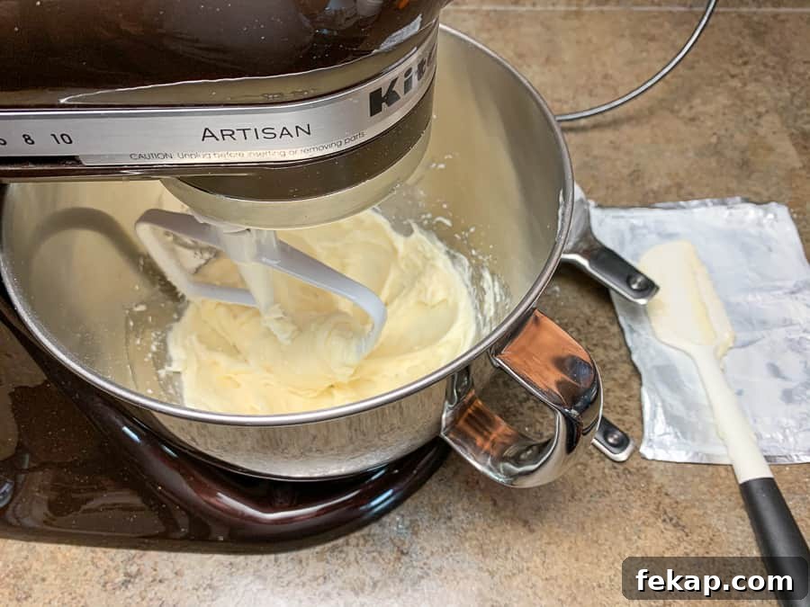 No-Bake Cherry Delight Recipe 7 Cream cheese beaten in mixing bowl
