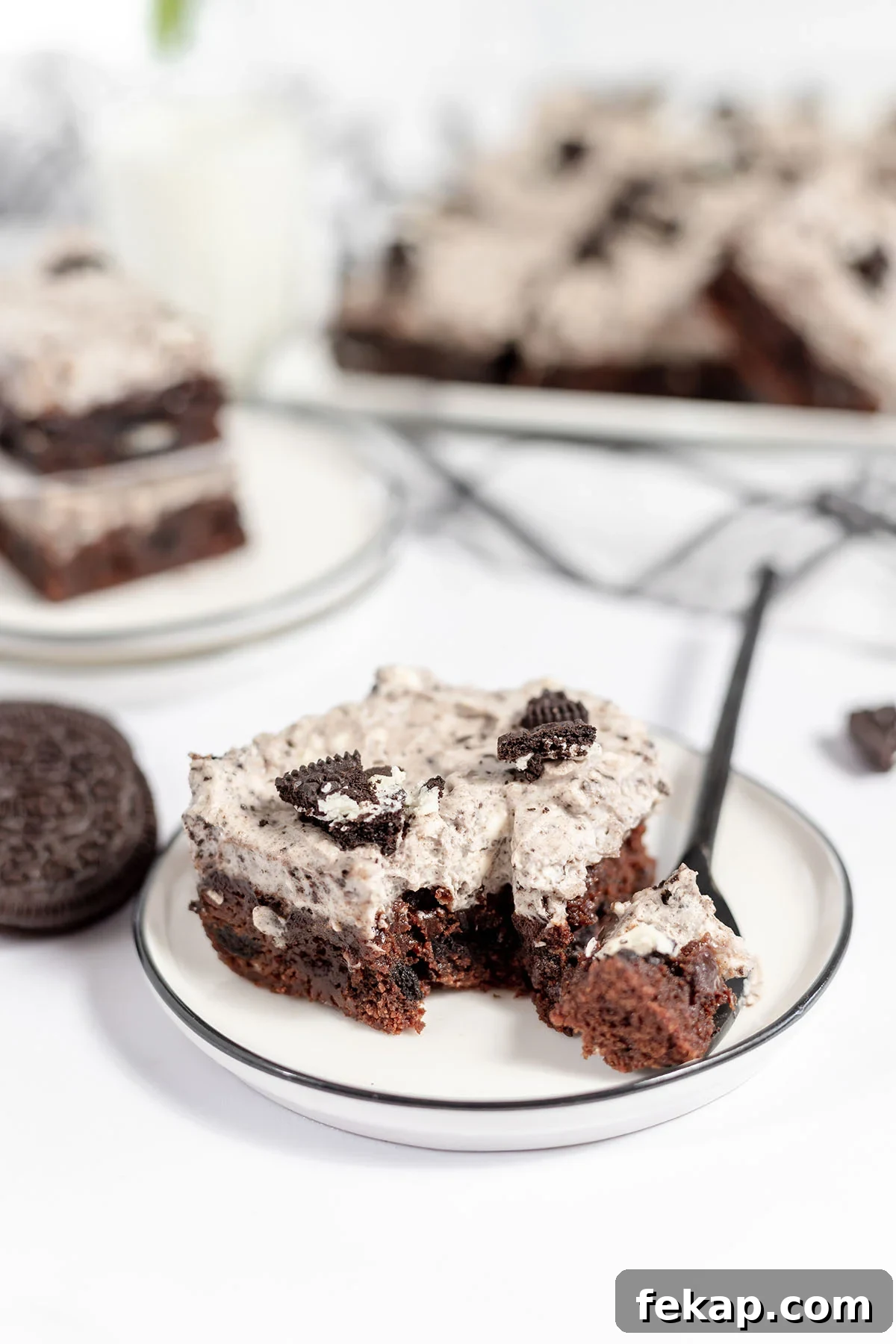 Slice of Cookies and cream brownies on a plate.