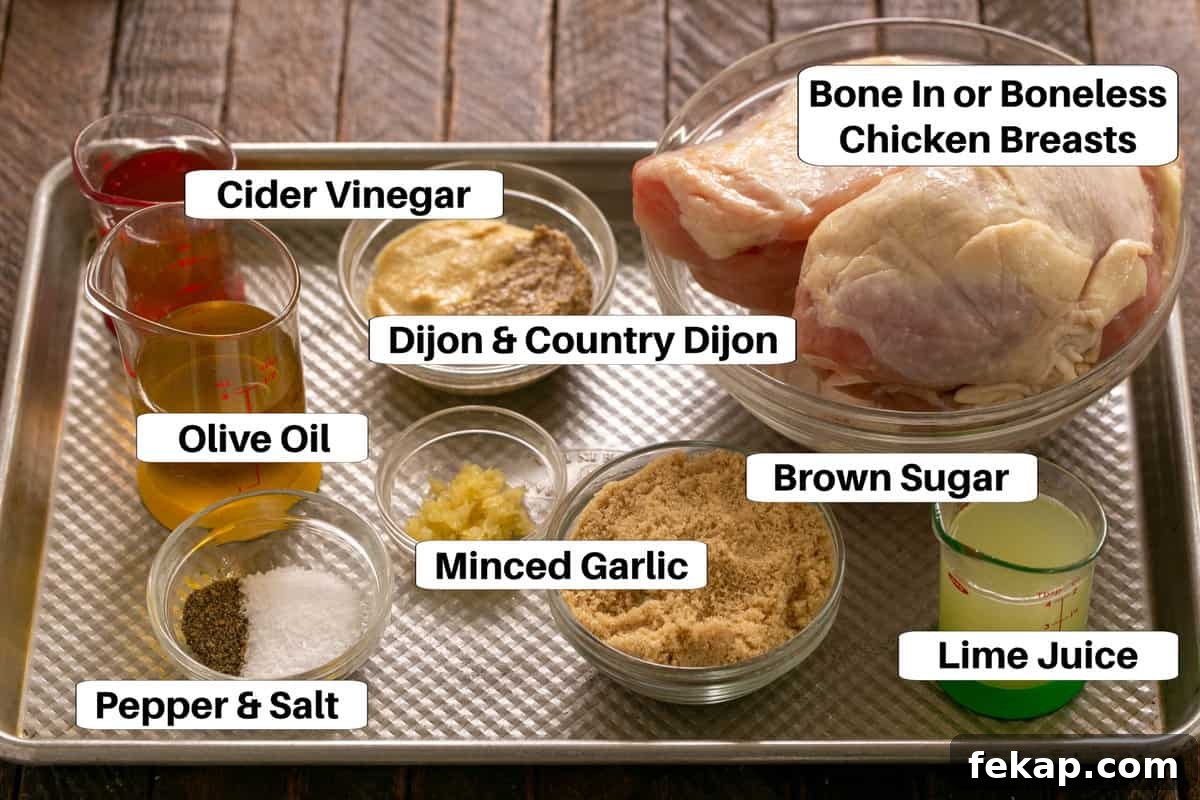 Zesty Mustard, Garlic and Lime Marinated Chicken Breasts 2 Chicken Marinade Ingredients on a sheet pan with labels.