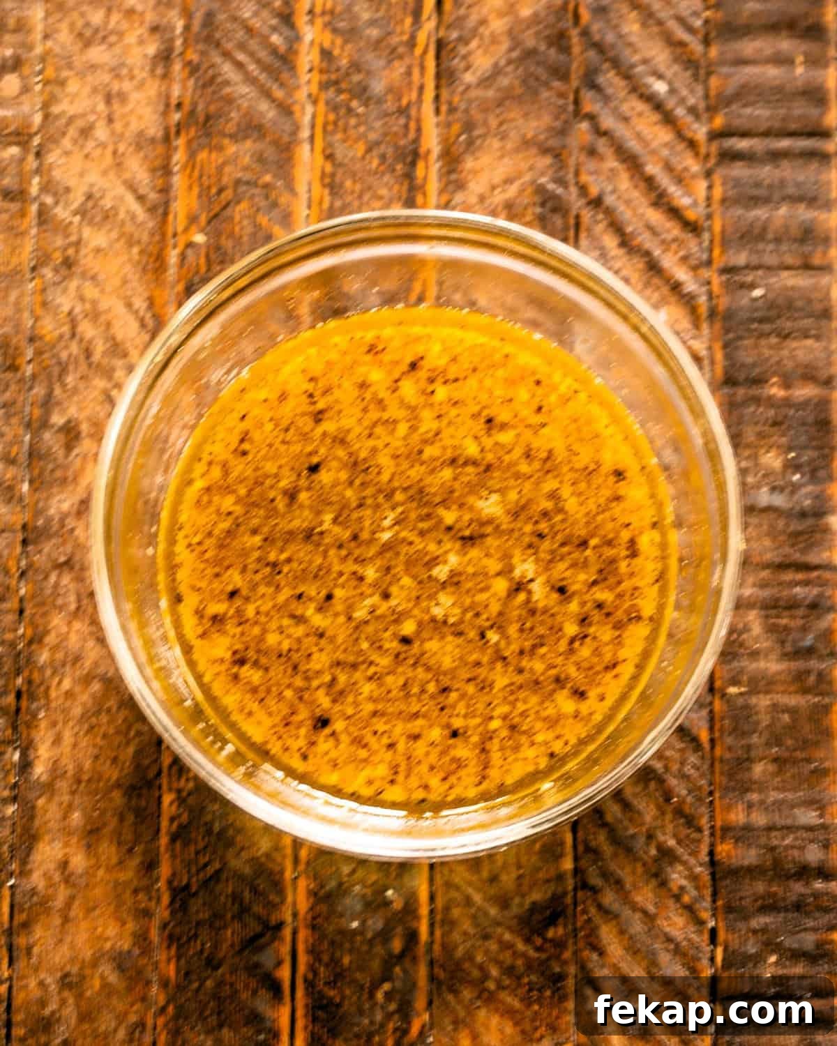 Zesty Mustard, Garlic and Lime Marinated Chicken Breasts 3 Chicken marinade in a glass bowl.