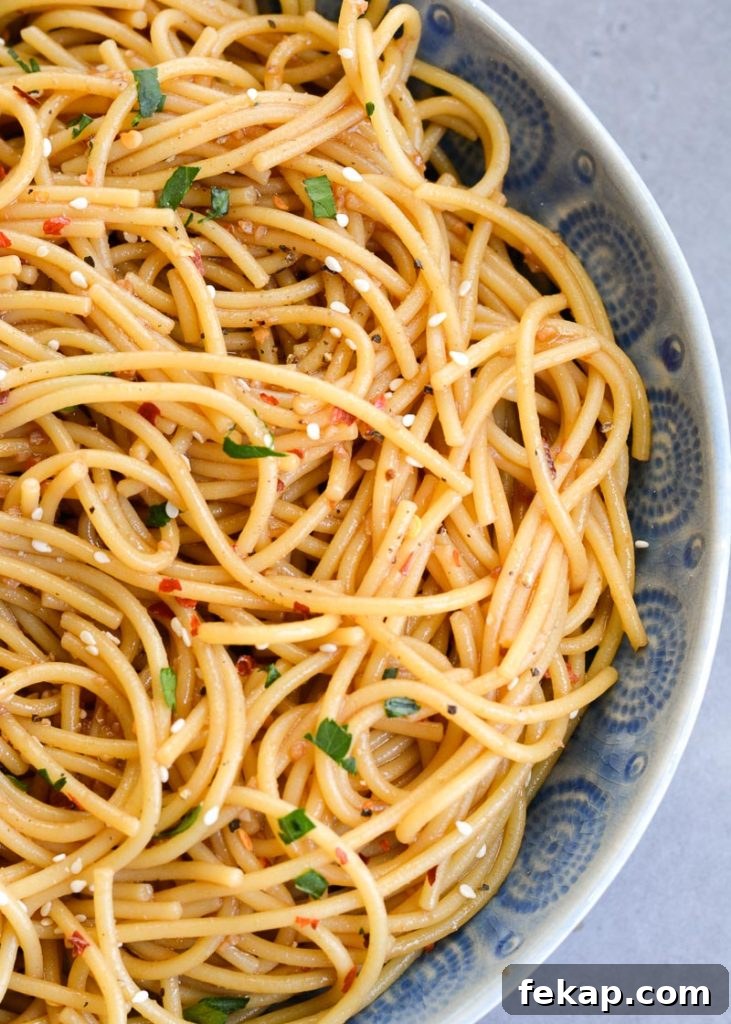 Gluten Free Sesame Noodles Recipe with Creamy Tahini Sauce 3 Bowl of sesame noodles with green onions