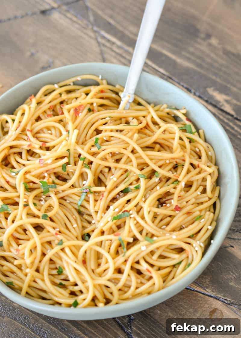 Gluten Free Sesame Noodles Recipe with Creamy Tahini Sauce 6 Sesame noodles with sesame seeds and scallions