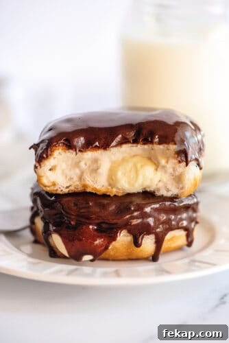 Mini Boston Cream Pies, Southern-Style 2 Bitten mini Boston cream pie on top of another
