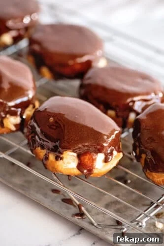 Mini Boston Cream Pies, Southern-Style 11 Mini Boston cream pies on wire rack