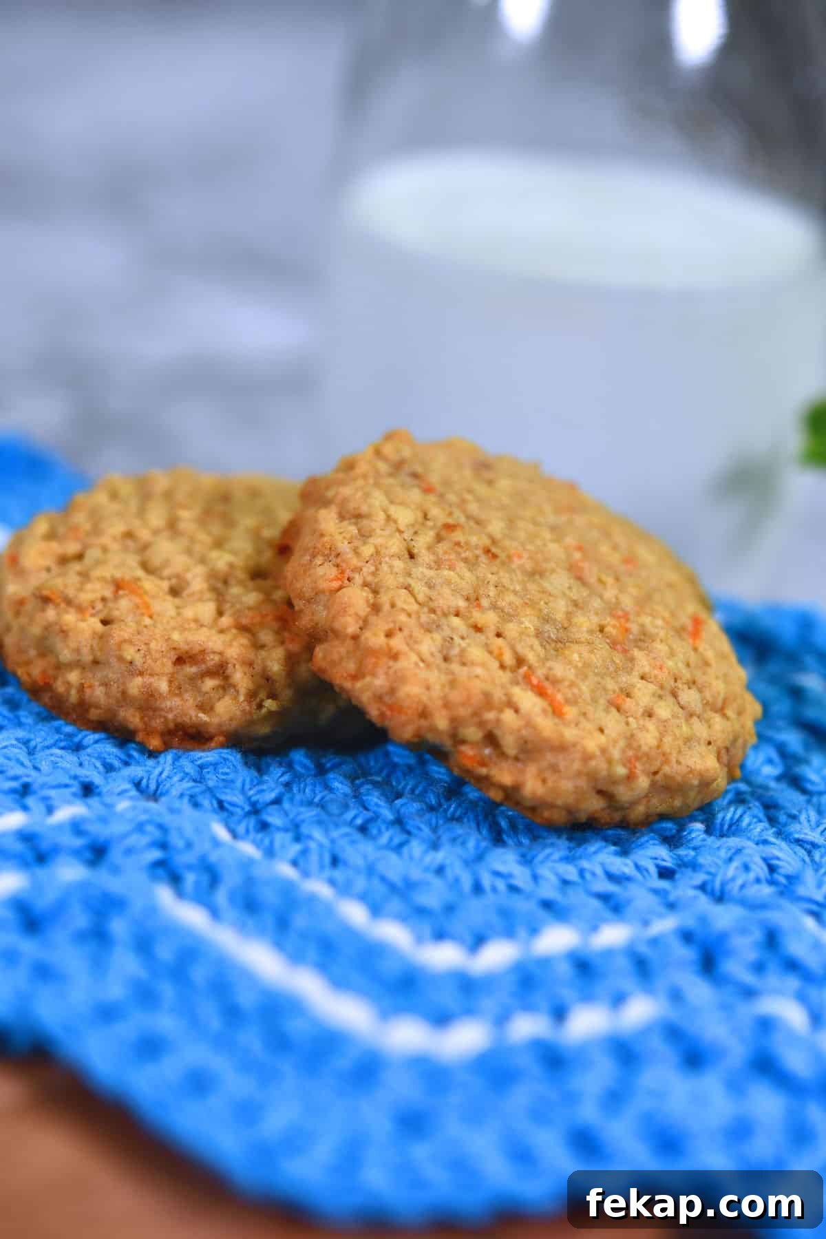 oatmeal carrot cookies on blue crocheted cloth.