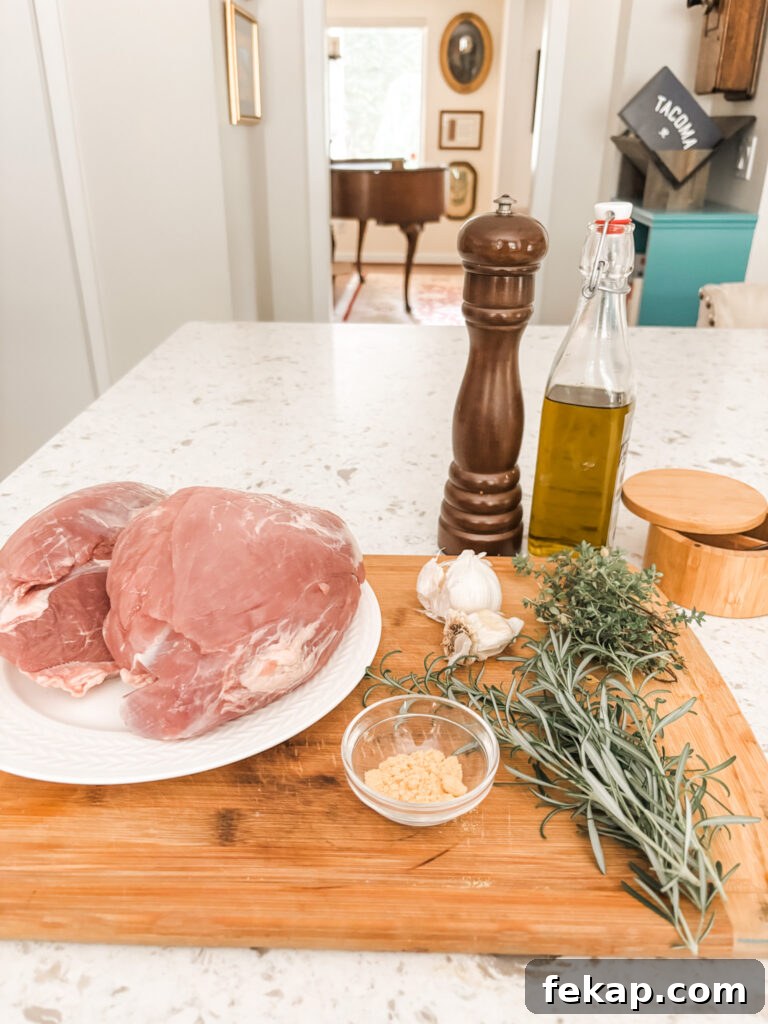 Herb-Rubbed Pork Sirloin Roast Recipe 4 The ingredients for the Pork Sirloin Roast on a countertop