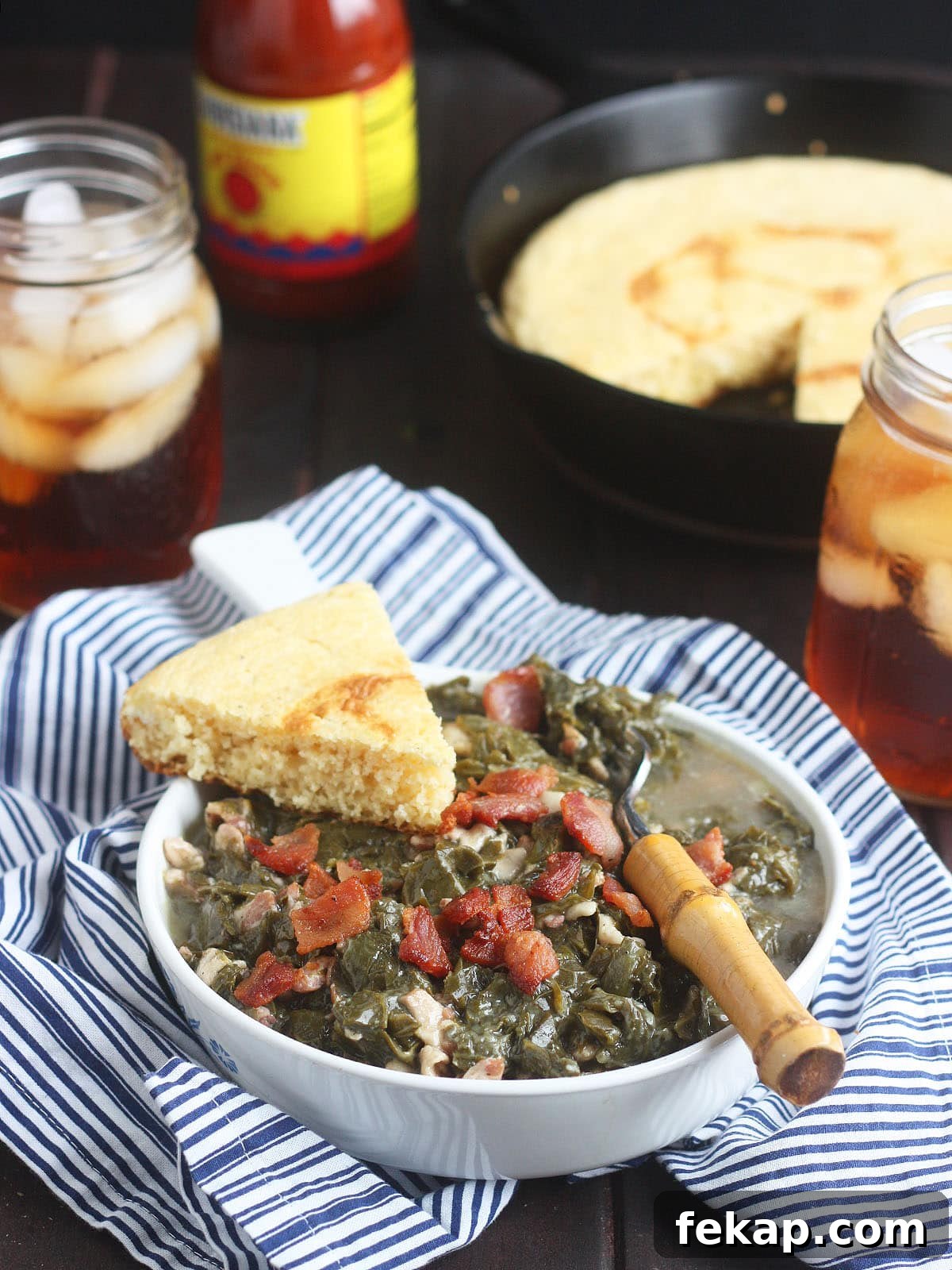 How to Make Southern Turnip Greens 11 Turnip greens in a bowl with a wedge of cornbread on the side.