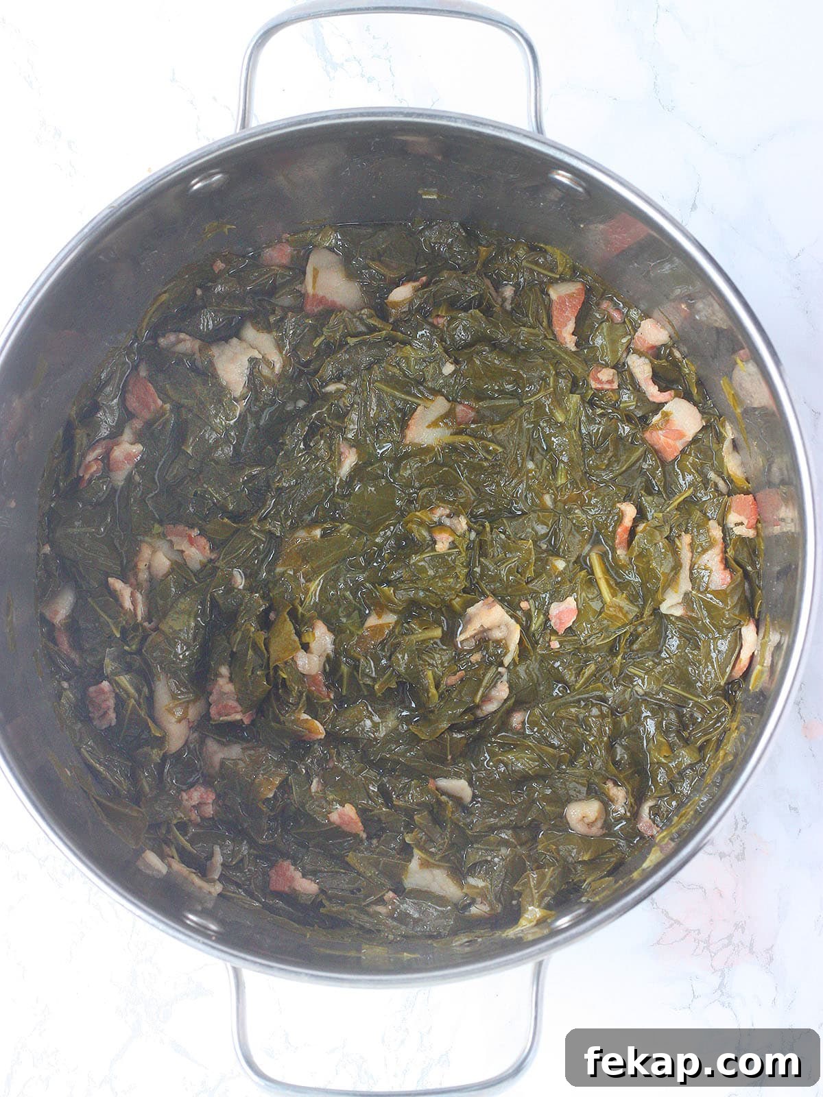 How to Make Southern Turnip Greens 10 cooked turnip greens in a stainless steel pot