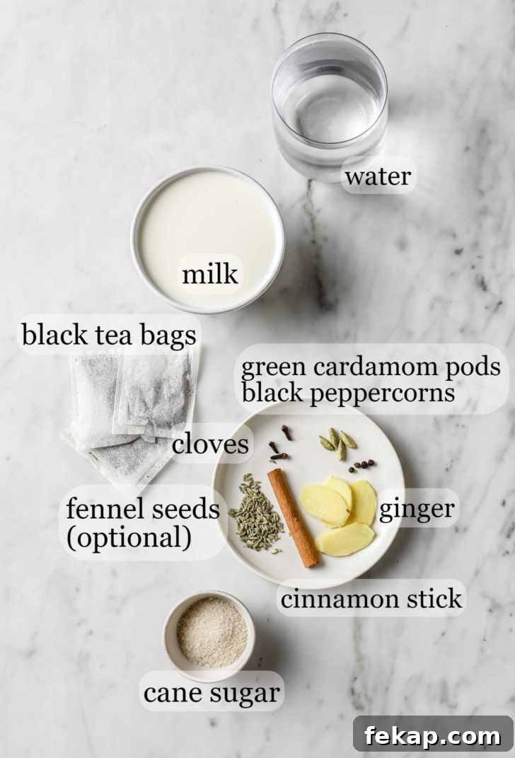 Authentic Masala Chai Recipe: Aromatic Spiced Tea 5 Masala Chai Ingredients such as milk, spices, ginger, and tea bags
