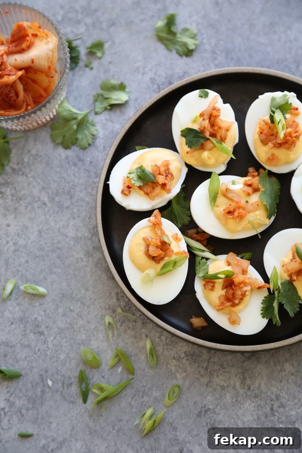 deviled eggs on a plate with herbs