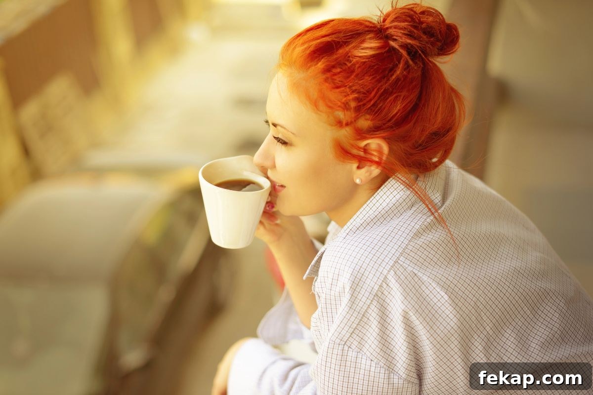 15 Common Foods That Are Toxic to Dogs 9 woman drinking a cup of coffee