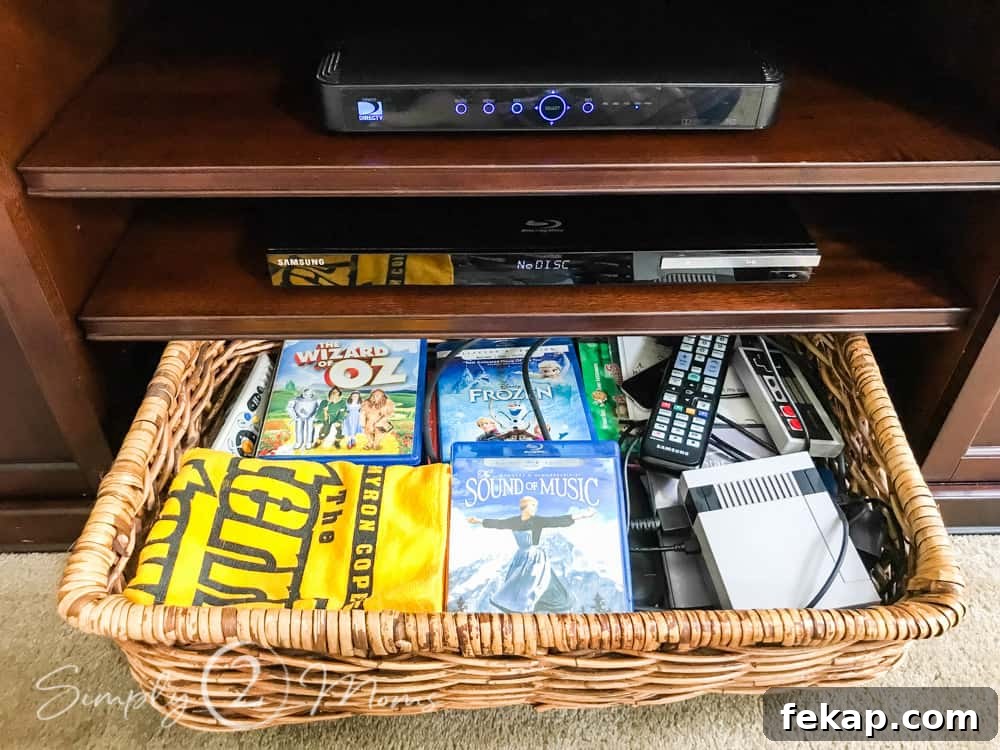long shallow basket filled with movies, game controllers