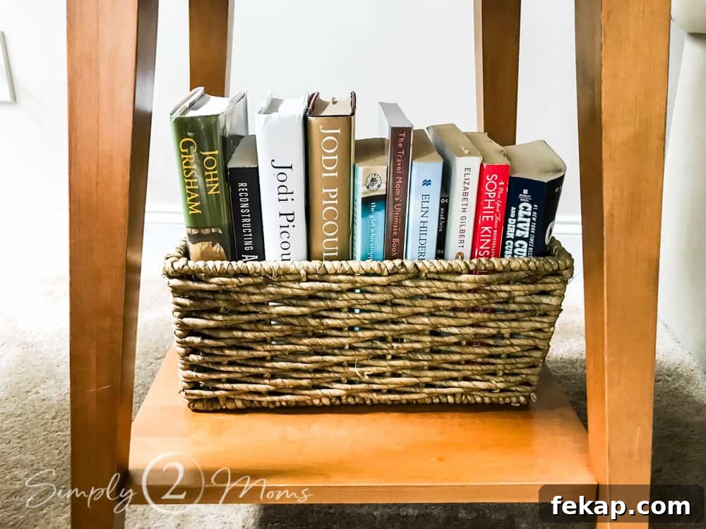 wicker basket filled with books on lower table shelf