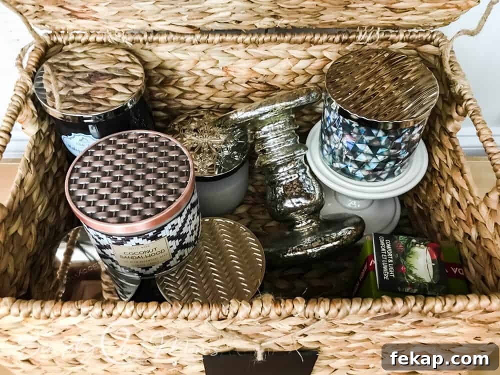 wicker lidded basket filled with glass candle jars